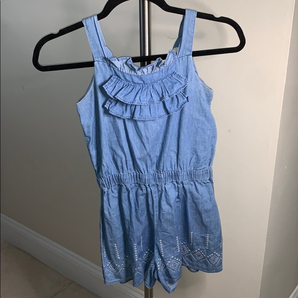 denim romper with details on the bottom